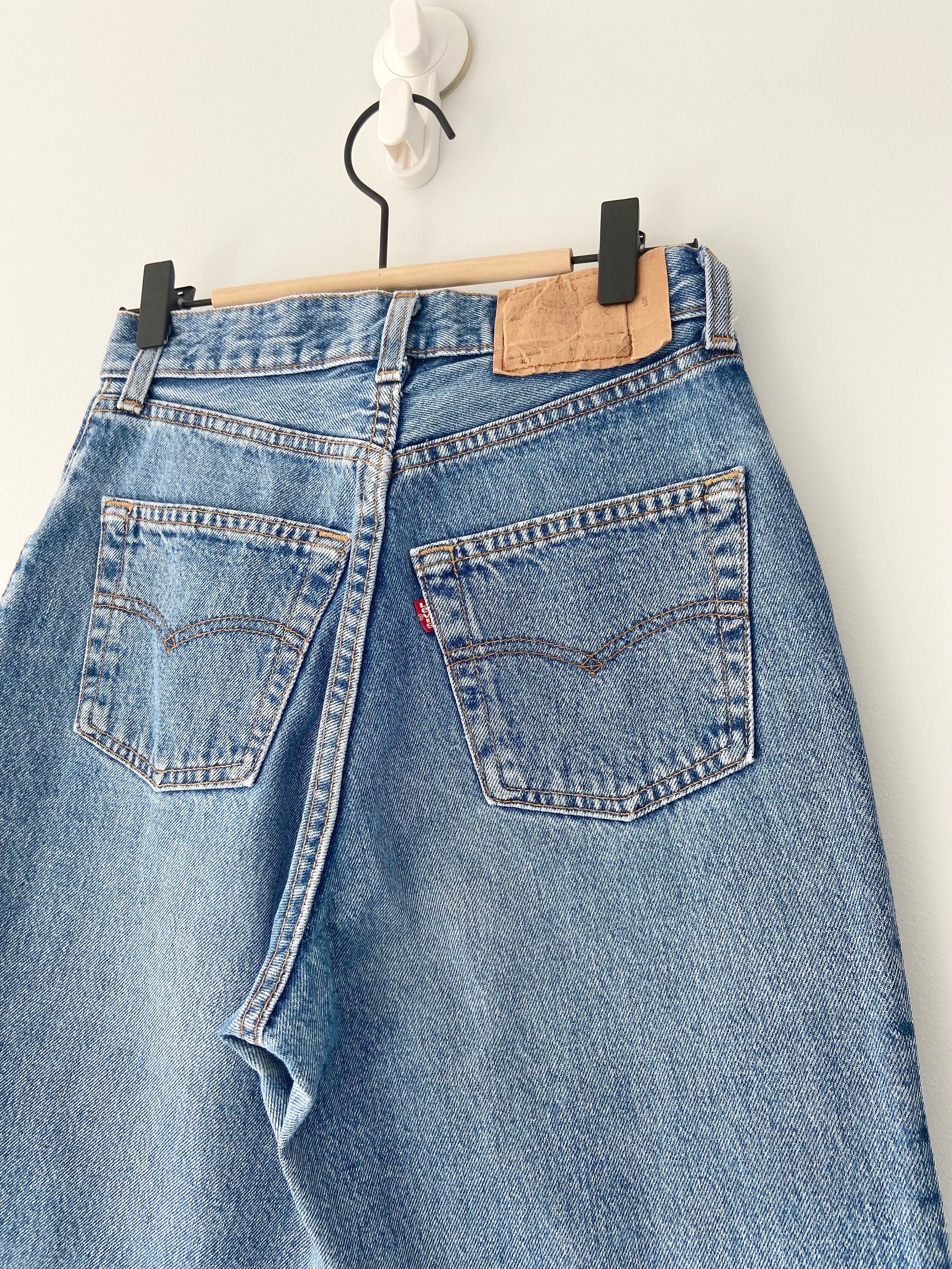 Vintage Levi’s 901  w26” L28” made in USA  Faded medium blue denim