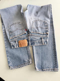 W23 L29 vintage Levis 701 22-24” measured waist faded denim made in USA 80s