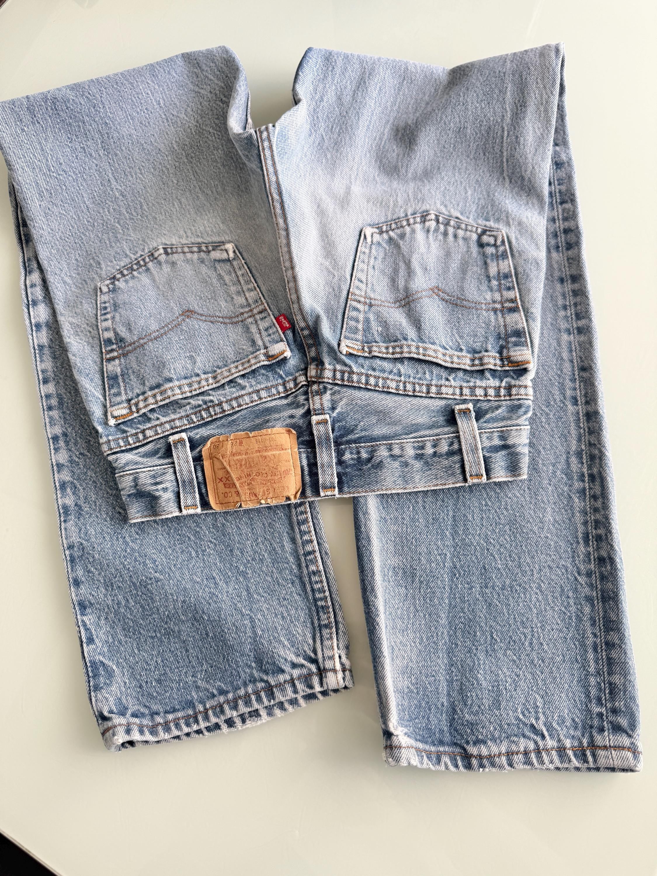 W23 L29 vintage Levis 701 22-24” measured waist faded denim made in USA 80s