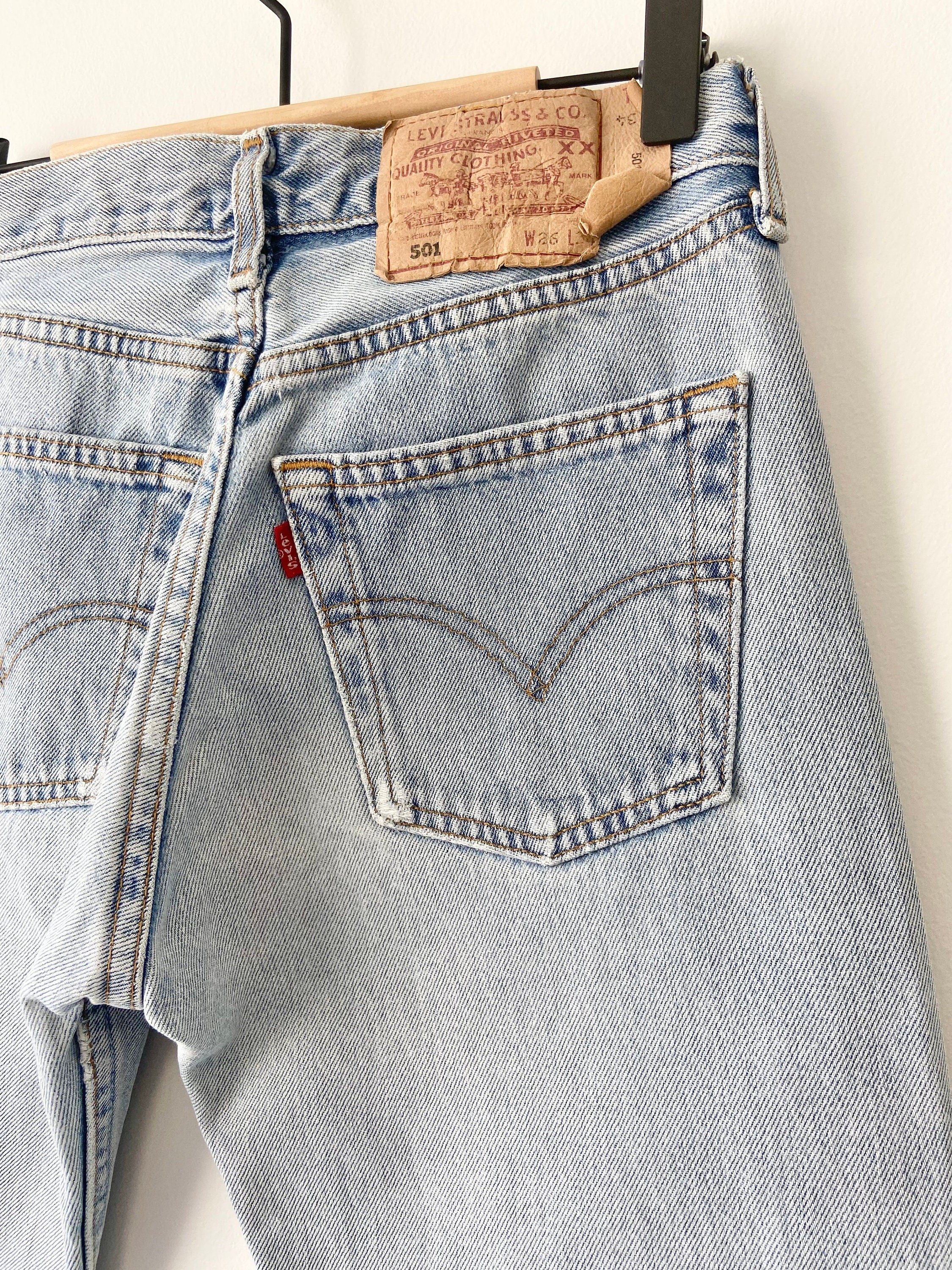 Levis 501 jeans w25 L34 90s light wash faded blue flared faded wash blue 501 vintage 501s