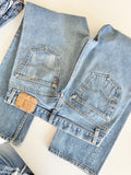Levis 501s  vintage w31 L29 medium faded blue 501s made in USA 80s straight leg jeans 501 30”/31” waist hol