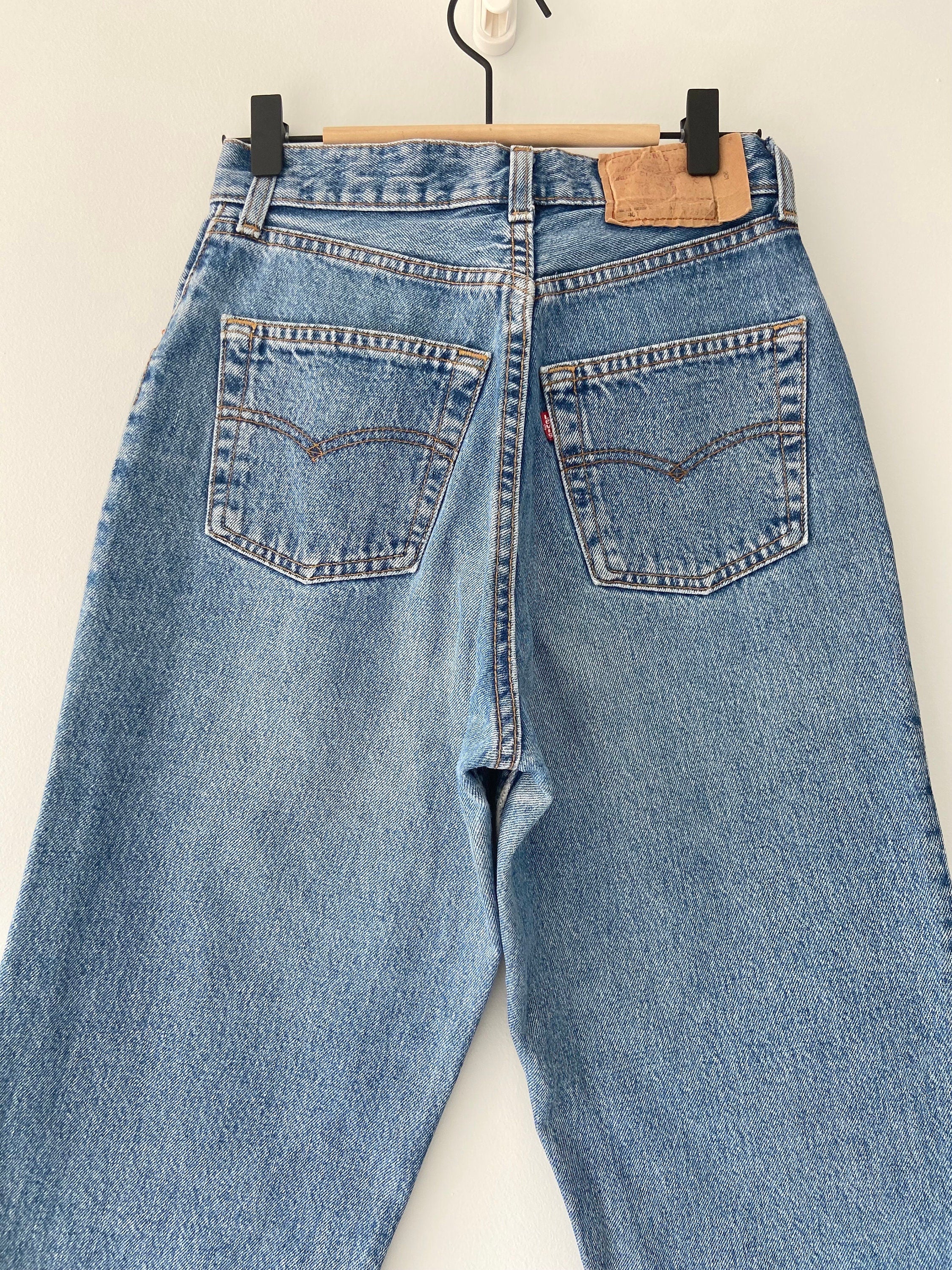 Vintage Levi’s 901  w26” L28” made in USA  Faded medium blue denim